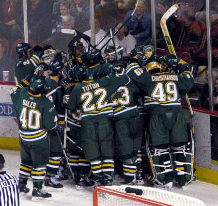 Bryce Christianson (#49) celebrating with teammates